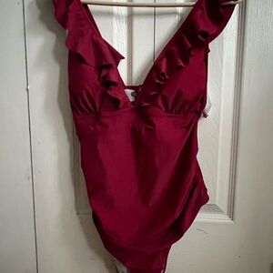 Cupshe. New with tags. Fusia Ruffled One-Piece Swimsuit. Lace up back.